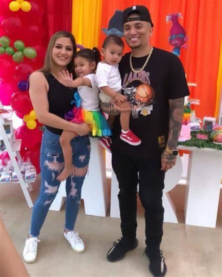 LGND with his wife and children
