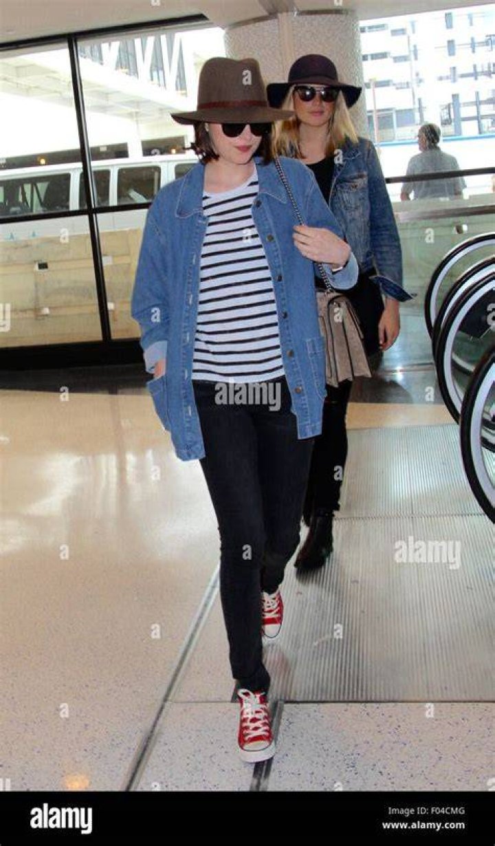 LOS ANGELES - JUN 8: Dakota Johnson arrives at the 12th Annual