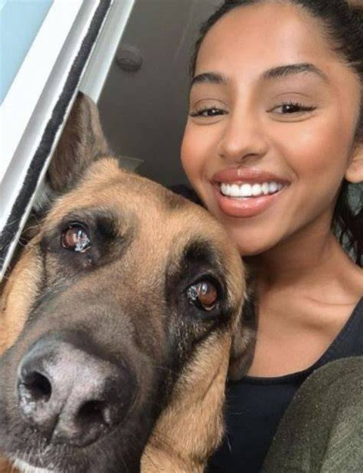Maria Thattil with her dog Alex