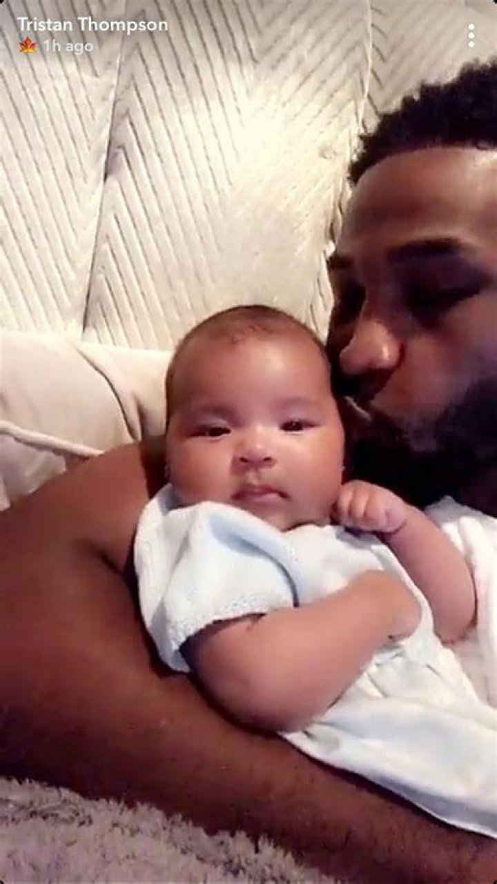 True Thompson Smiles With Baby Psalm West