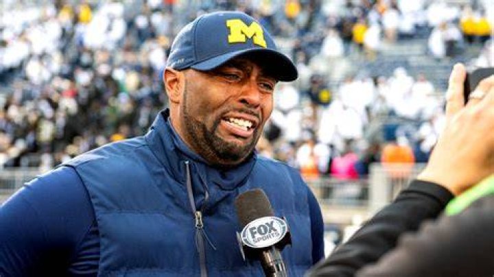 What just happened to Michigan coach?